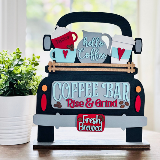 A decorative wooden coffee bar interchangeable insert featuring a vintage truck design with coffee cups and text decorations.