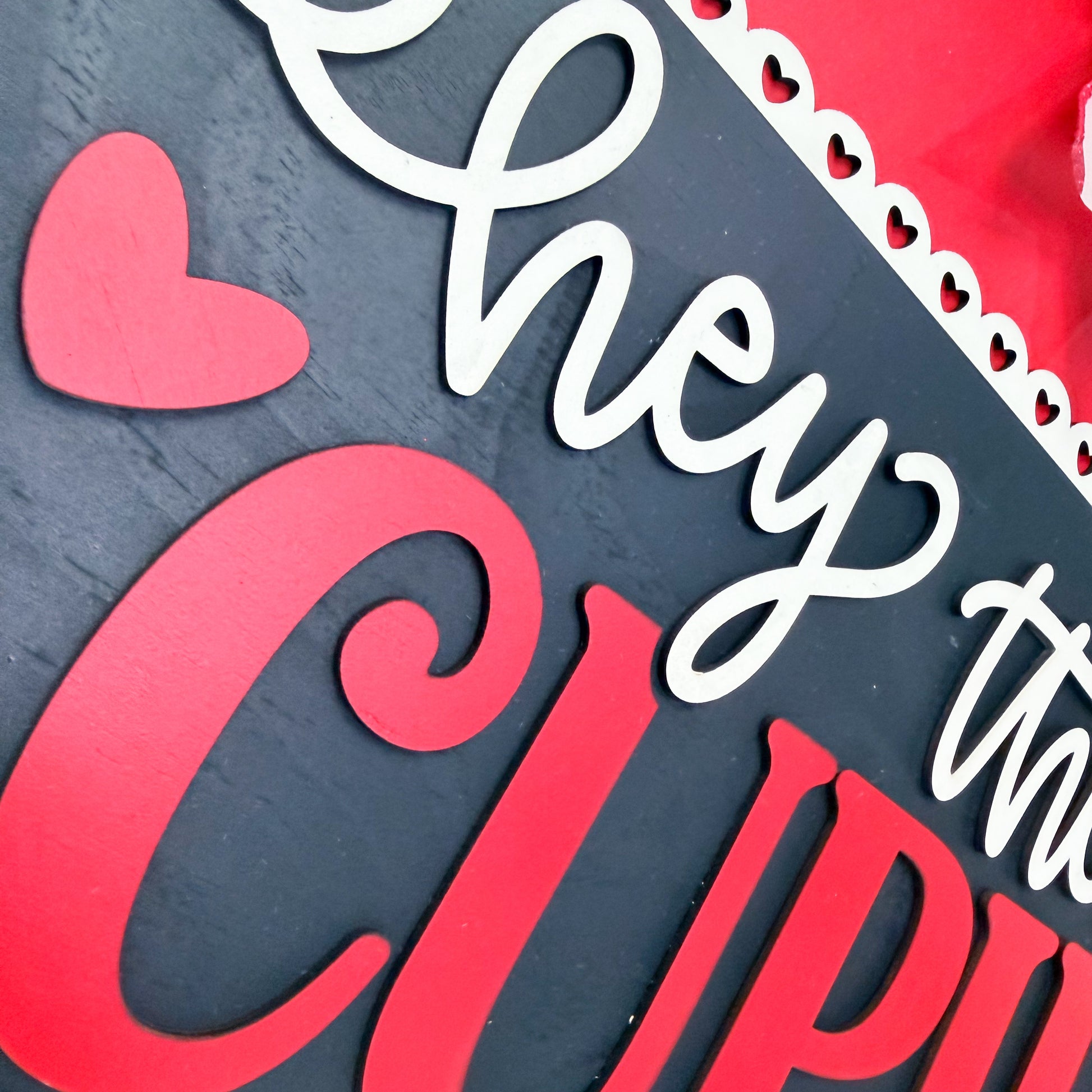 Decorative text with hearts on a dark background