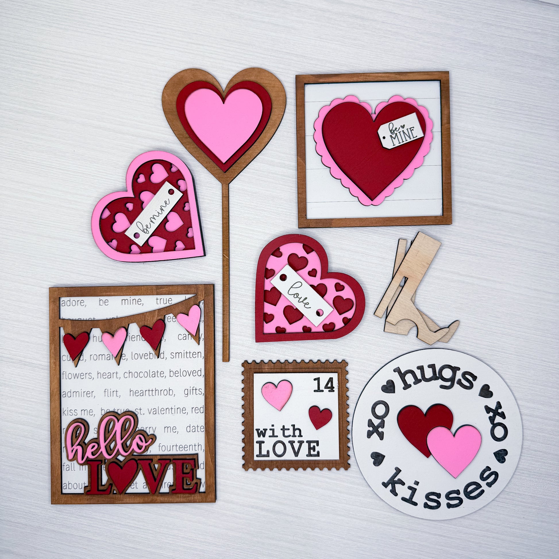 Collection of heart-shaped pieces and decorations on a white background