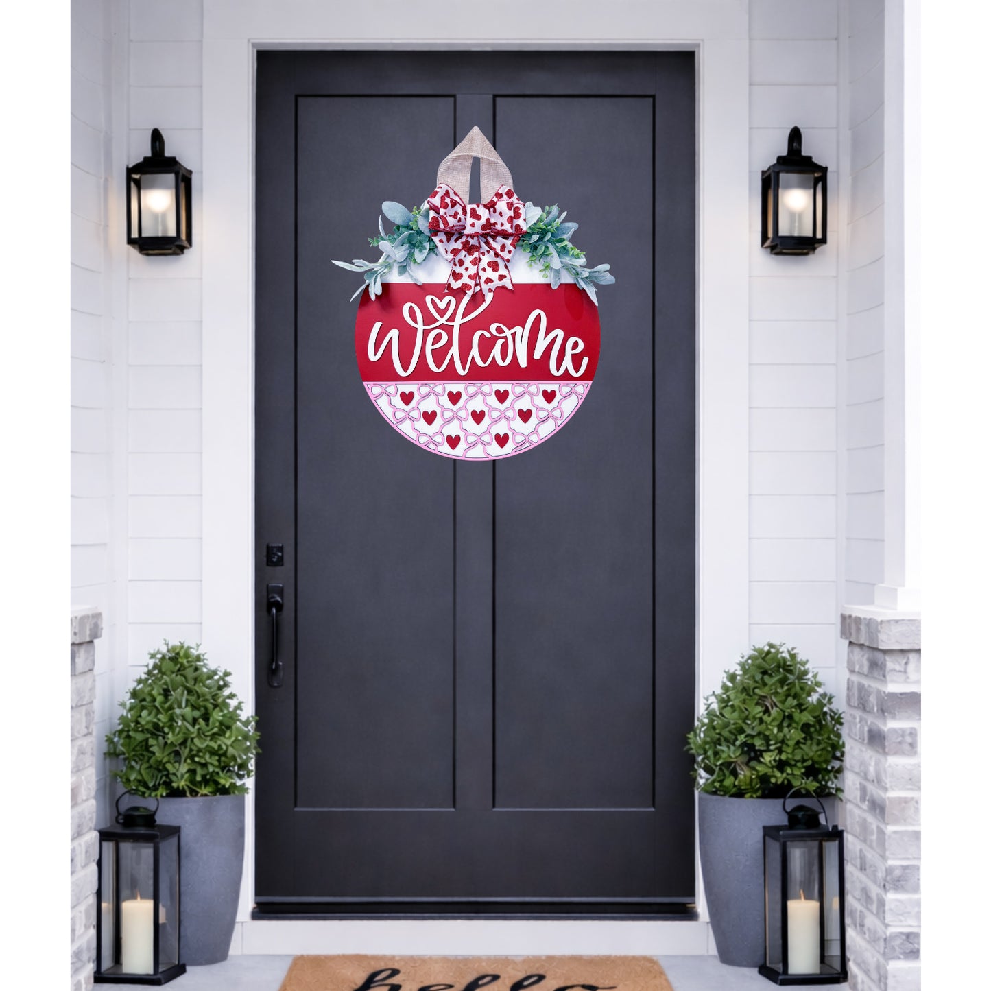 Decorative door hanger with 'Welcome' text on a black door.