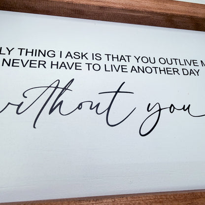 Wooden frame with a romantic quote on a white background