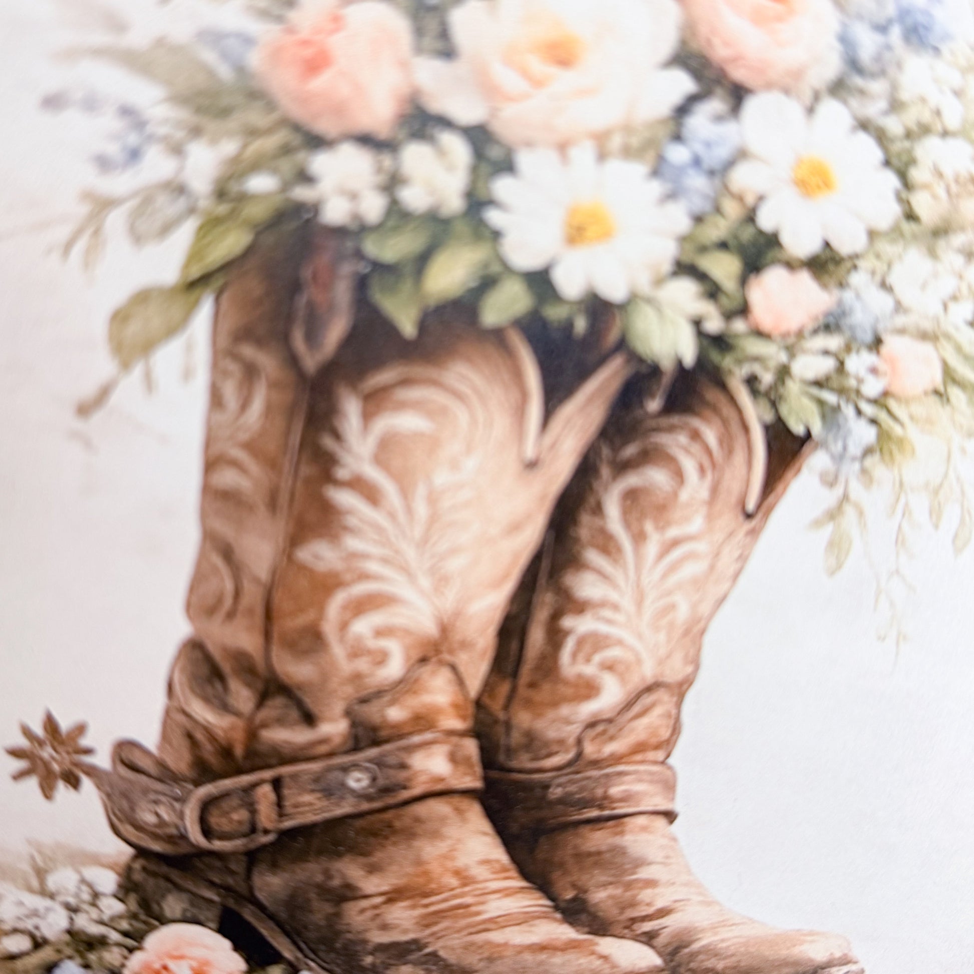 Decorative arch with cowboy boots and floral design