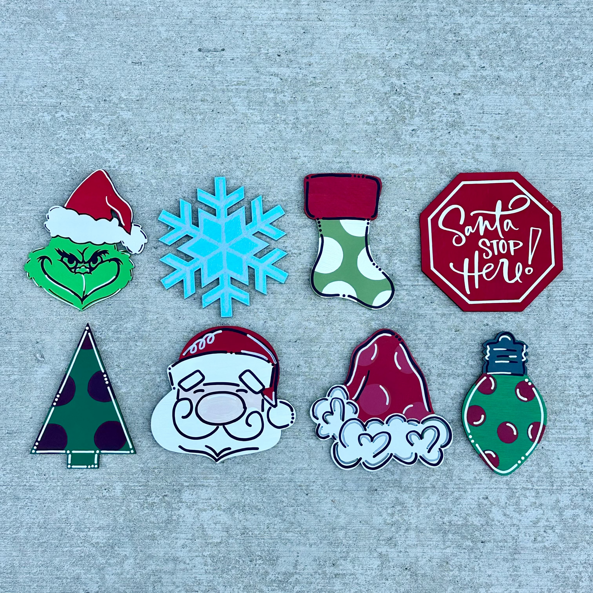 Set of Christmas-themed pieces on a textured gray background