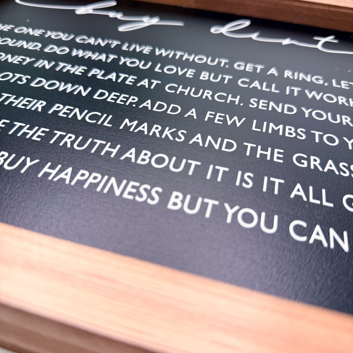 Textured surface with white text on a black background
