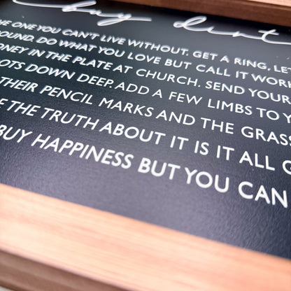 Textured surface with white text on a black background