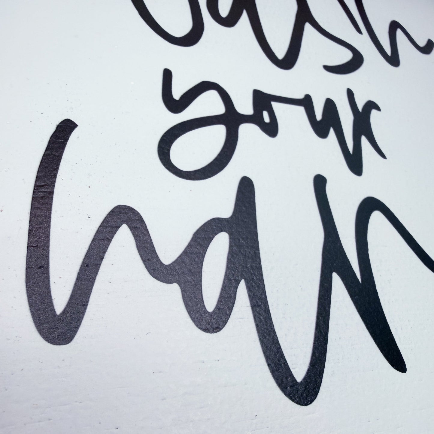 Black cursive text on a white background