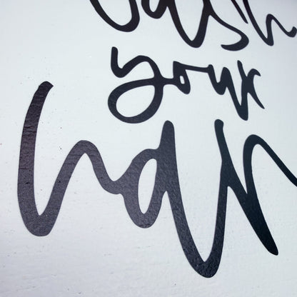 Black cursive text on a white background