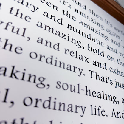Close-up of text on a page with a blurred background