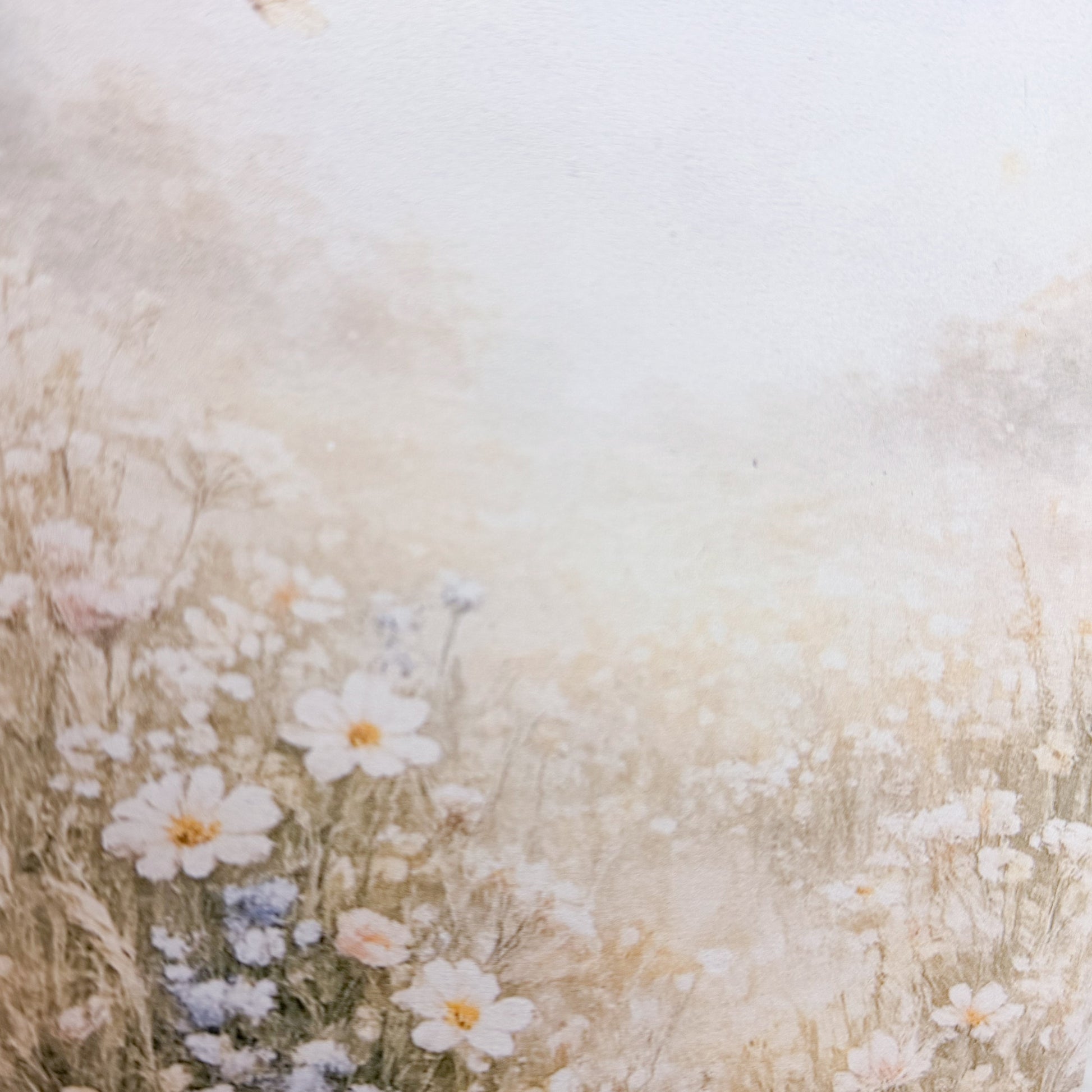 Artistic depiction of flowers and grasses on a textured beige background