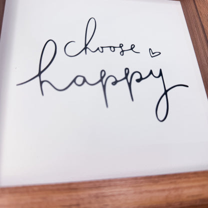 Motivational quote 'Choose happy' on a white background