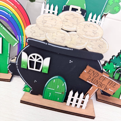 Decorative item with a pot of gold, rainbow, and 'End of the Rainbow' sign on a white background