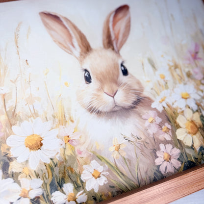 Field with a rabbit and floral design on a white background